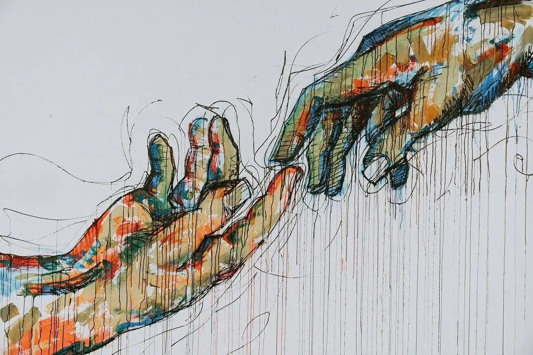 Abstract painting of two colorful hands reaching toward each other, fingertips almost touching, on a white background.