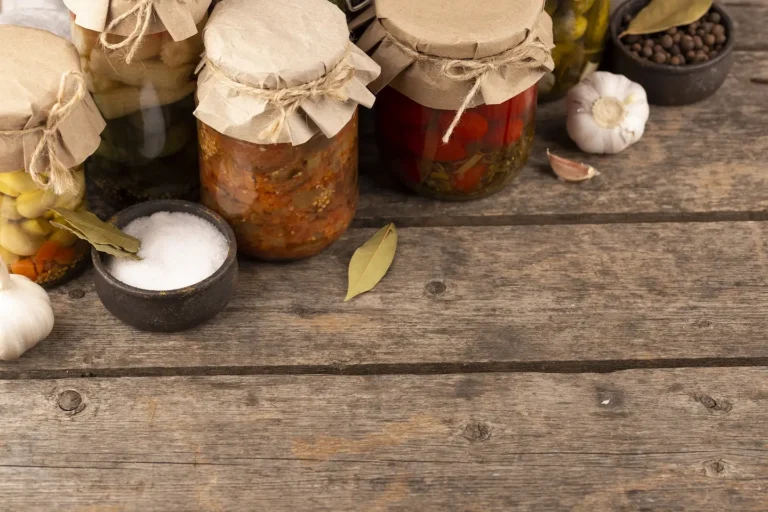 Fermentation variations in jars on a wooden table