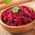 Mediterranean Style Fermented Grated Beetroot in a wooden bowl