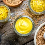 Homemade fermented mustard steps showcase on a wooden table